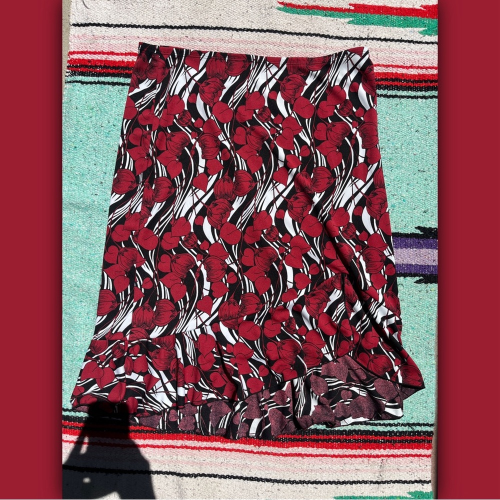 BCBG - Red and black swirled and floral midi skirt with slight slit in the front